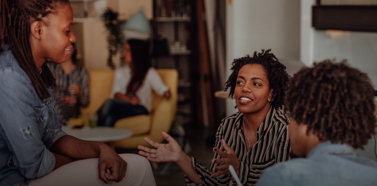 Community organizers meeting around a table